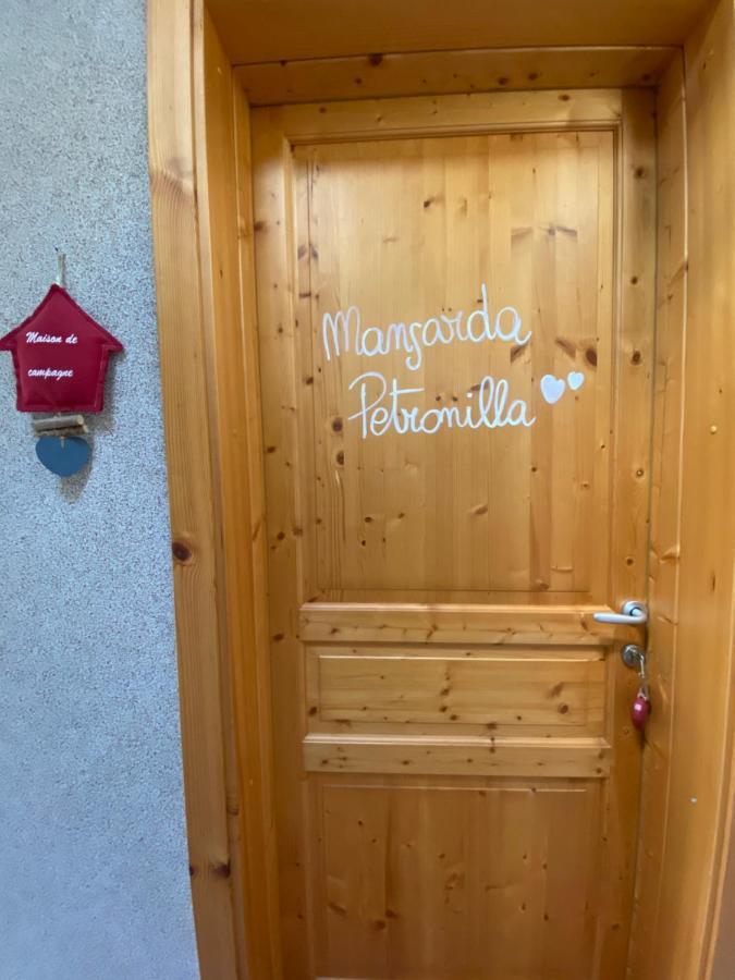 Mansarda Petronilla Apartment Piazzatorre Exterior photo